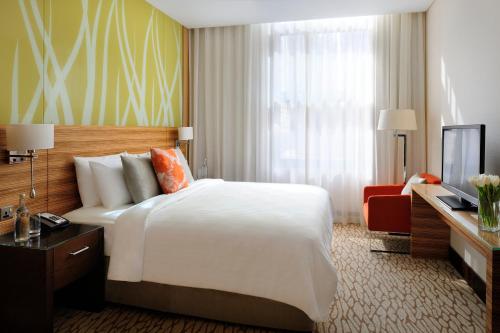 Tempat tidur dalam kamar di Courtyard by Marriott World Trade Center, Abu Dhabi