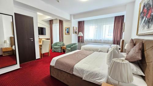 Lova arba lovos apgyvendinimo įstaigoje Bucur Accommodation