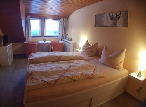 Cama ou camas em um quarto em Haus Rosenbühl