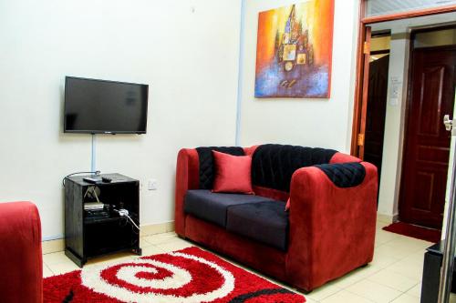 TV tai viihdekeskus majoituspaikassa MILANY HOMES - near JKIA airport and SGR train station