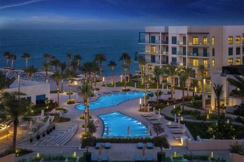 Piscina de la sau aproape de Capital Stay- Private Two Bed Apartment - The Address Beach Resort Residences Fujairah