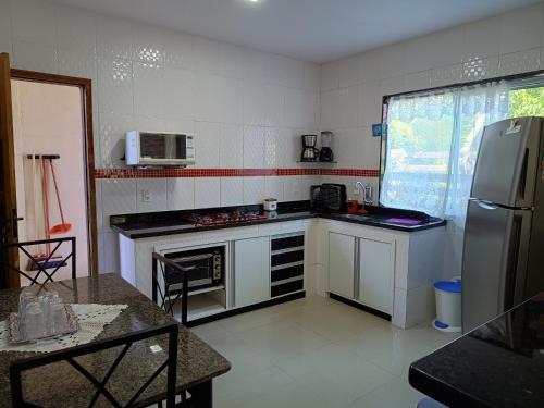 Una cocina o kitchenette en Casa temporada