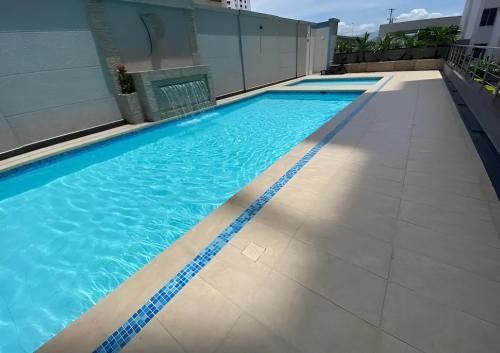 The swimming pool at or close to Apartamentos Amoblados Confort Turismo en Cúcuta