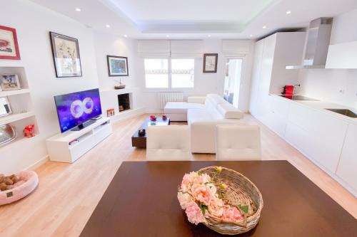 Uma TV ou centro de entretenimento em Anna & Thomas - Sitges Center Apt