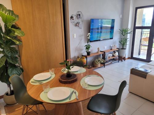 Apartamento Boutique Barra da Tijuca Península में टेलीविजन और/या मनोरंजन केंद्र