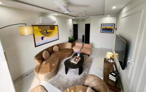 A seating area at Two-Bedroom Luxury Apartment, Zameen Opal