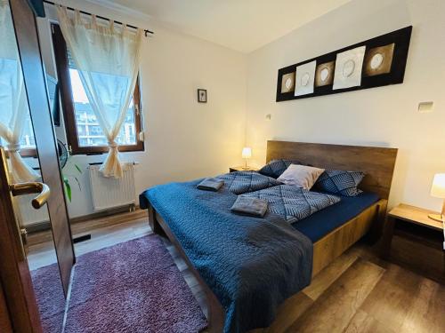 Postel nebo postele na pokoji v ubytování Marcello Wellness Apartment