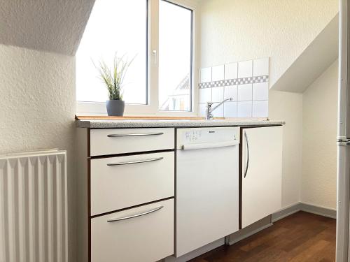 Two-Bedroom Apartment Located On The Third Floor Of A Four-Story Building In Fredericia tesisinde mutfak veya mini mutfak