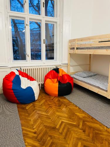 A bed or beds in a room at Hostel Green World