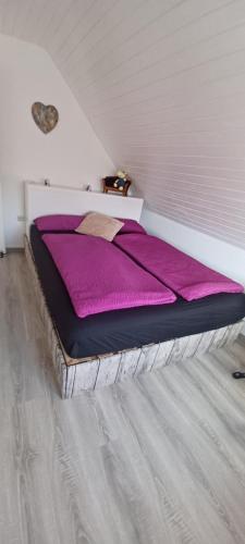 Cama ou camas em um quarto em Sonja gemütliche Ferienwohnung