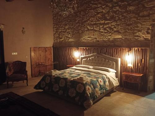 A bed or beds in a room at Agriturismo Tenuta Filippi