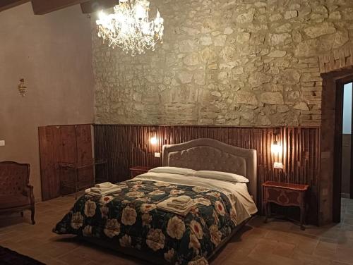 A bed or beds in a room at Agriturismo Tenuta Filippi