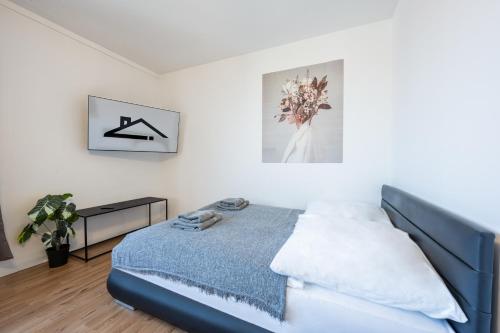 Ліжко або ліжка в номері Modernes Apartment Wels City Center