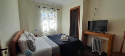 Voodi või voodid majutusasutuse Guesthouse, Ap Veríssimo toas