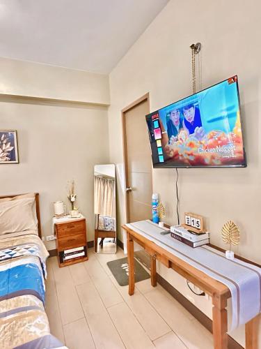 מיטה או מיטות בחדר ב-Condo in Newport City Pasay near NAIA T3 AIRPORT MANILA