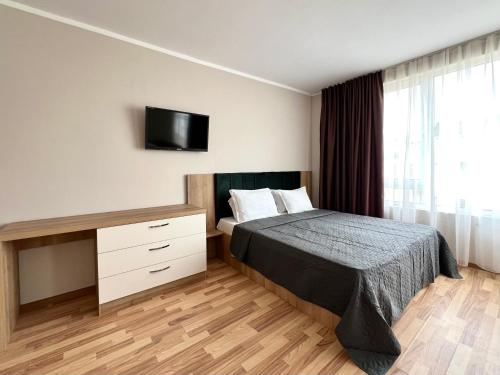 Кровать или кровати в номере Sineva Del Sol Apartments