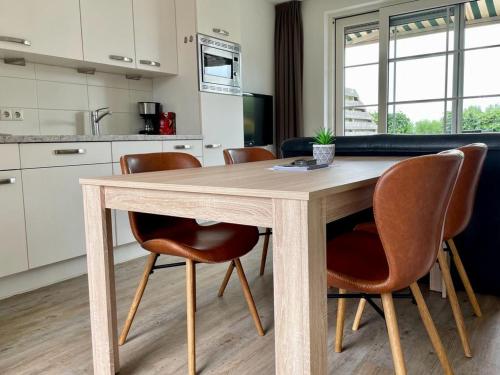 Una cocina o kitchenette en Vakantiewoningen de Schelp