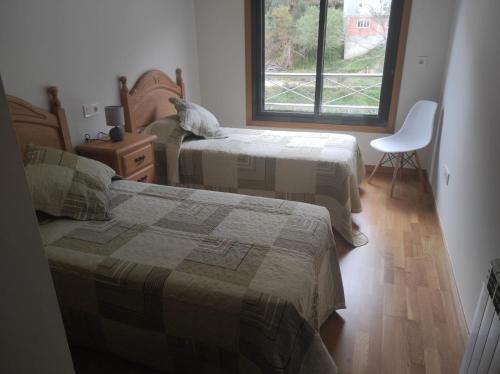 Una cama o camas en una habitación de Pedaporta