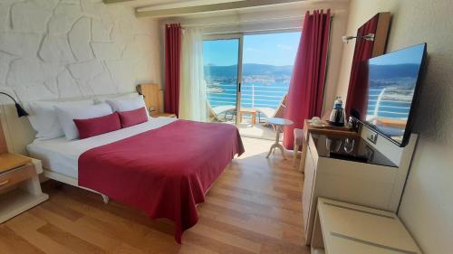 Rúm í herbergi á Prive Hotel Bodrum - Adult Only