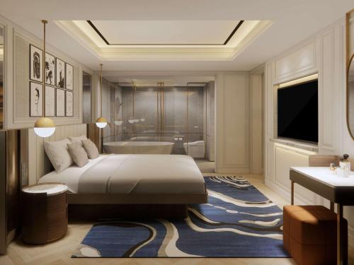 Tempat tidur dalam kamar di Mövenpick Hotel Jakarta City Centre