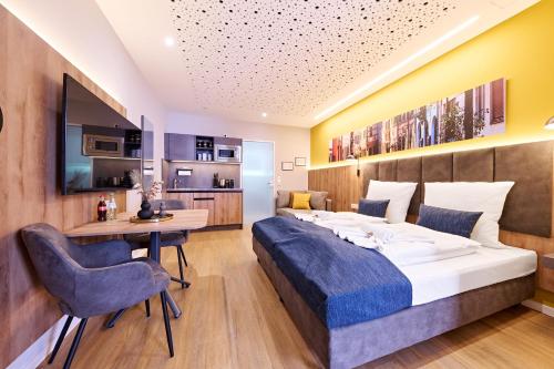 Tempat tidur dalam kamar di XZLLENZ Traum Studio-Apartment, Frei-Parken, U-Bahn, Küche