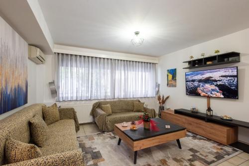 טלויזיה ו/או מרכז בידור ב-KG Acropolis Escape Spa Apartment