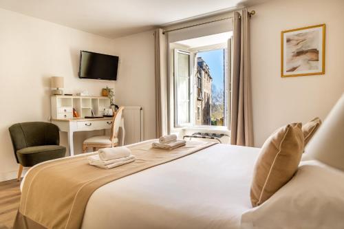 Krevet ili kreveti u jedinici u objektu Demeures & Châteaux - Hôtel De La Porte Saint-Malo