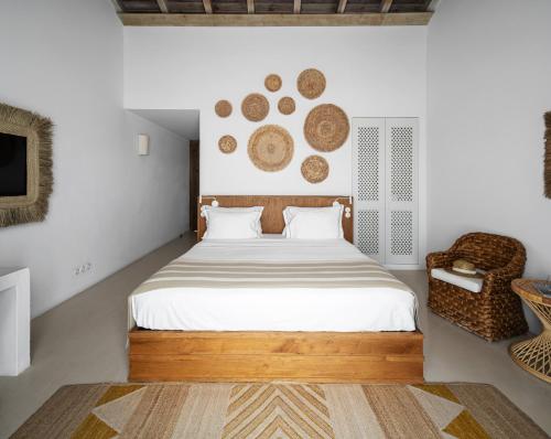 A bed or beds in a room at Quinta Da Comporta - Wellness Boutique Resort