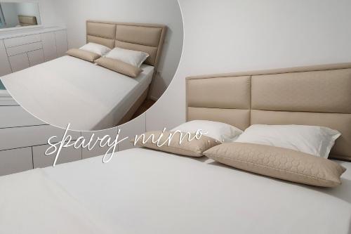 Tempat tidur dalam kamar di West Wing - Apartmani Živinice