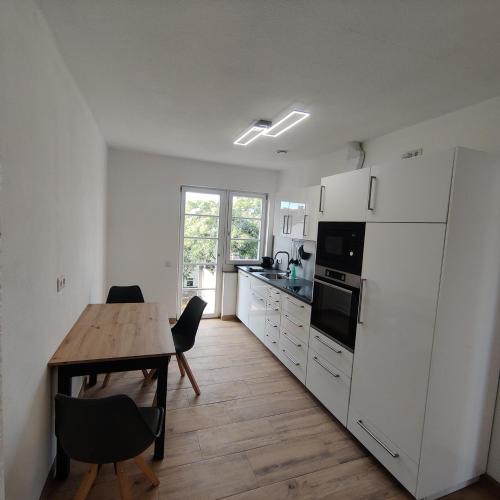 Η κουζίνα ή μικρή κουζίνα στο City Apartments Offenbach