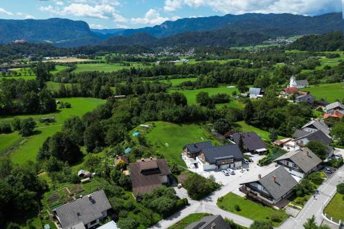 an aerial view of a house in a village at LUCKA BLED quiet location, free bikes, big garden, doctor in Bled