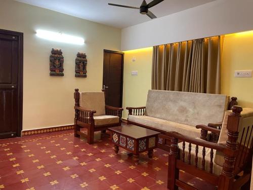 O zonă de relaxare la Viswa Residency Srirangam - Heritage Rooms