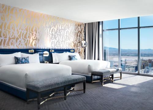 Tempat tidur dalam kamar di The Cosmopolitan Of Las Vegas