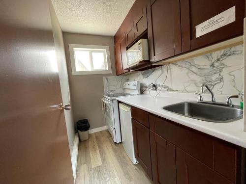 Una cocina o kitchenette en Rondo Motel