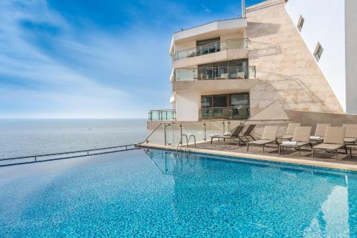 The swimming pool at or close to Sesimbra Oceanfront Hotel - Preferred Hotels and Resorts