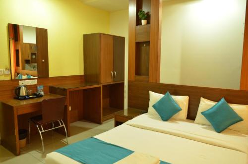 Cubbon Suites - 10 Minute walk to MG Road, MG Road Metro and Church Street房間的床