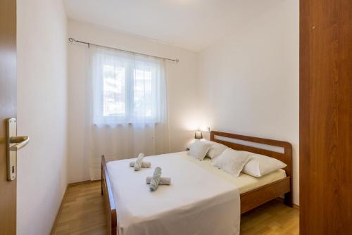 Lova arba lovos apgyvendinimo įstaigoje Cozy Apartment Tony