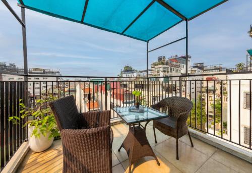 Bella Rosa Hotel & Travel tesisinde bir balkon veya teras