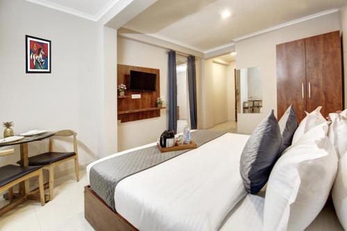 Vuode tai vuoteita majoituspaikassa Limewood Stay - Executive Huda City Center