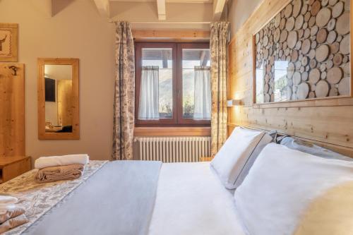 Krevet ili kreveti u jedinici u objektu La Tana dell'orso Hotel & SPA