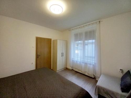 Krevet ili kreveti u jedinici u okviru objekta Apartment Centar