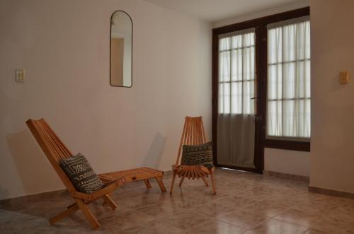 A seating area at "LA CASONA MARTINEZ" - GH Departamentos