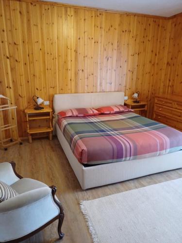 Una cama o camas en una habitación de Bormio Flat