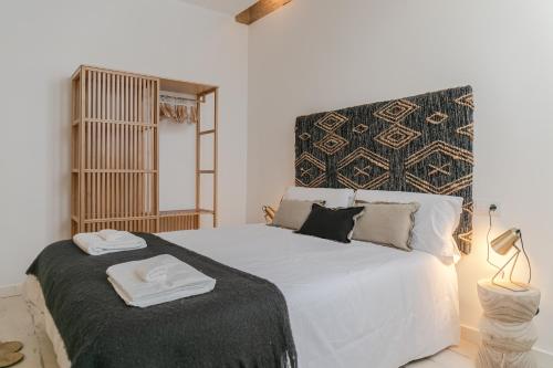 A bed or beds in a room at Espectacular casa con terraza privada