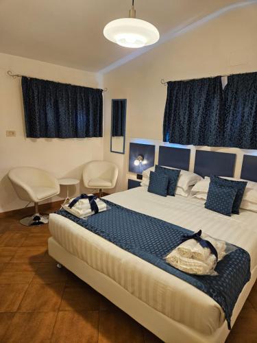 Кровать или кровати в номере Albis Rooms Guest House