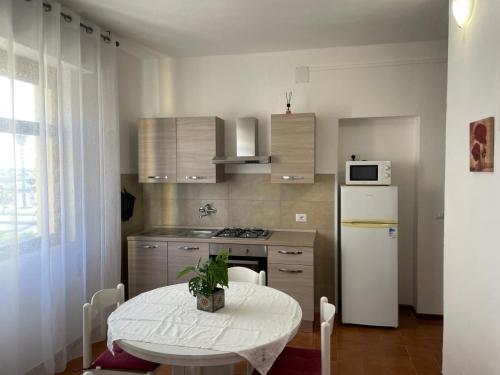 A kitchen or kitchenette at A due passi dal mare