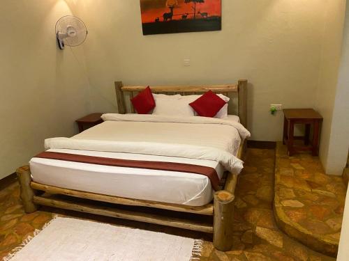 Posteľ alebo postele v izbe v ubytovaní Afro Smile Hotel & Guest House