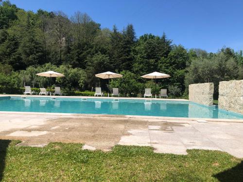 The swimming pool at or close to Quinta de Barbêdo - Turismo Rural