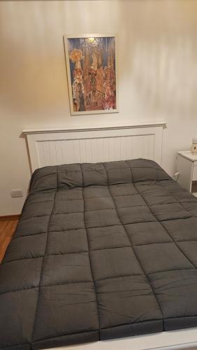 Postel nebo postele na pokoji v ubytování Acogedor departamento 1 dormitorio