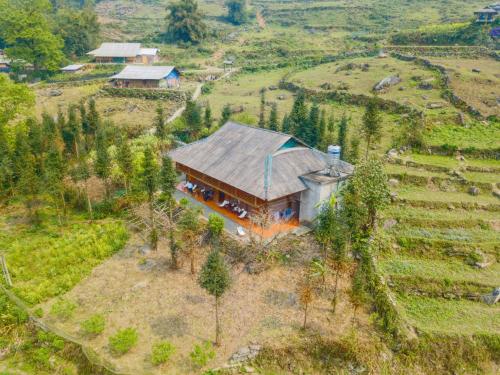 an aerial view of a house on a hill at Sapa's soul hillside in Sa Pa